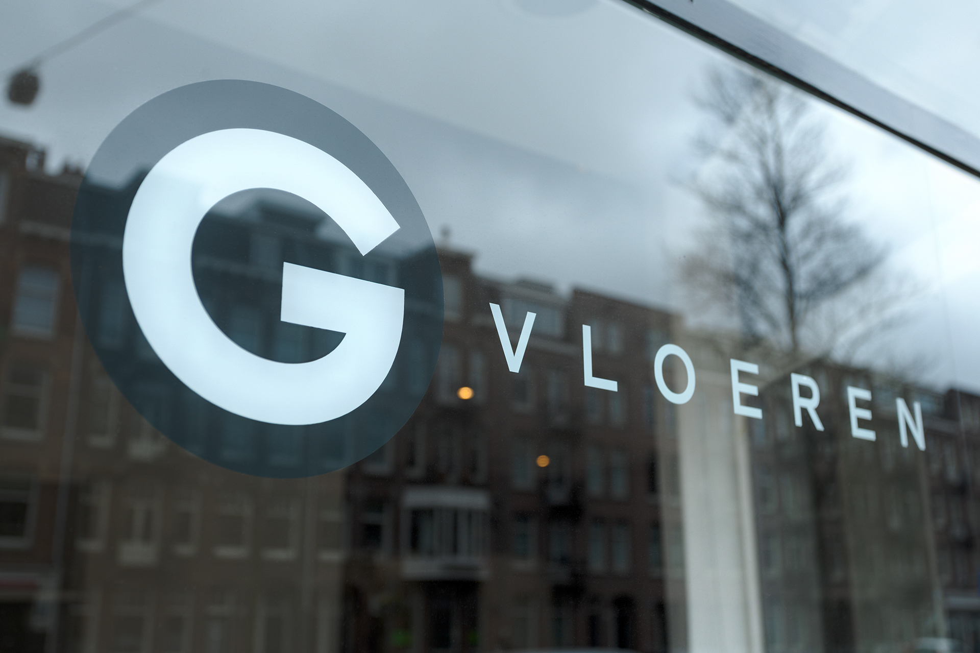 G-vloeren logo