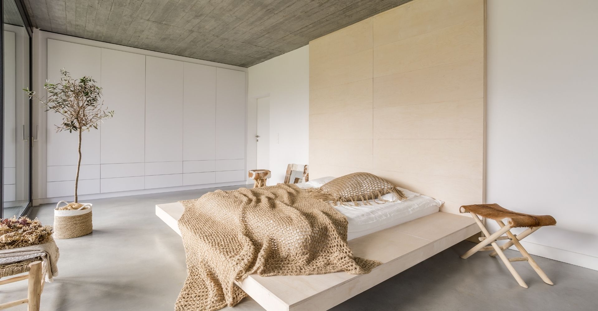 Gevlinderde betonvloer slaapkamer